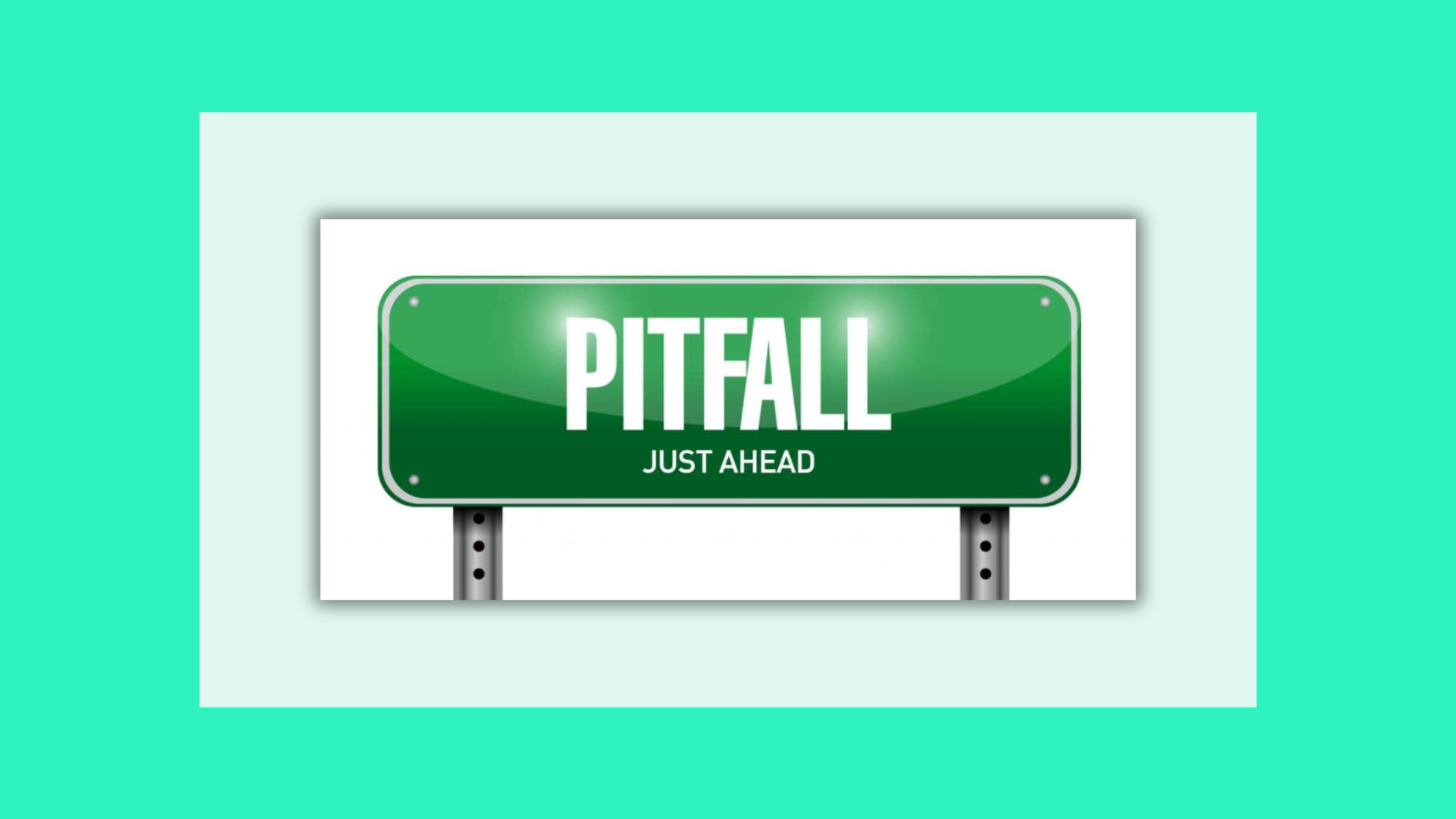  Green road sign that says pitfall just ahead in white letters